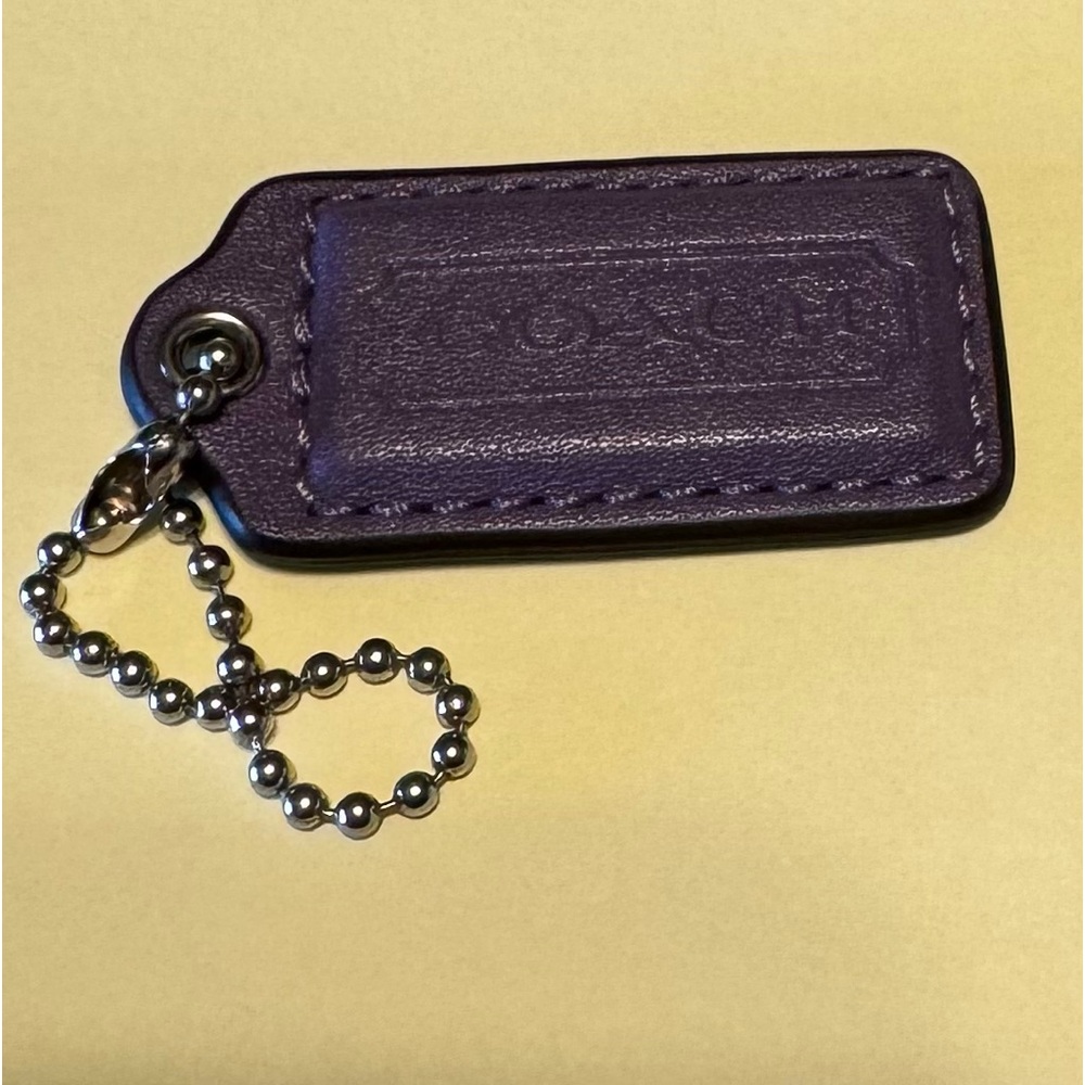 EUC Coach Purple Tag